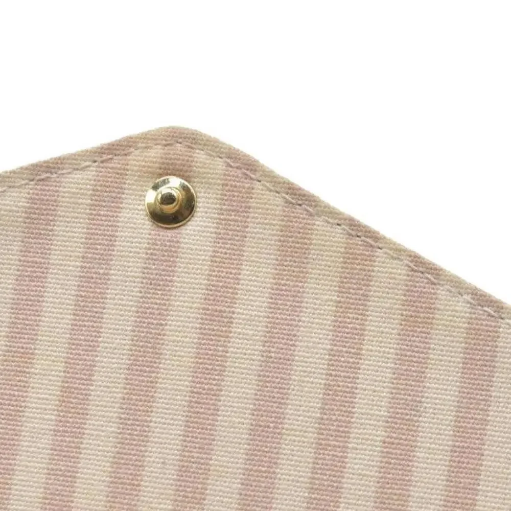 Louis Vuitton House's signature Monogram Pochette Felicie